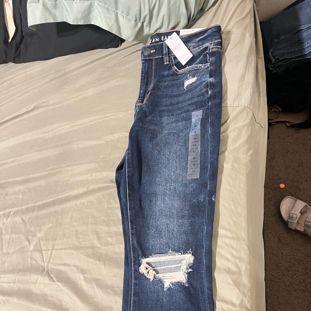 Distressed Blue Jeans